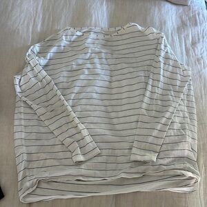 Lululemon back in action long sleeve
Size 6
White with black thin stripes